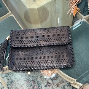 Black color clutch, no return